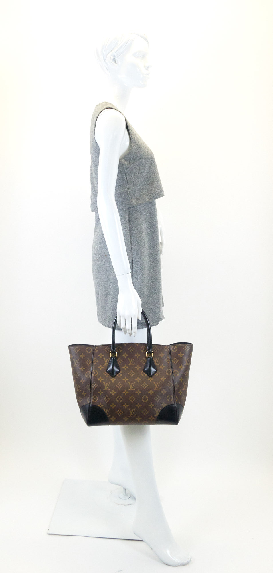 phenix mm monogram canvas and calfskin leather tote bag