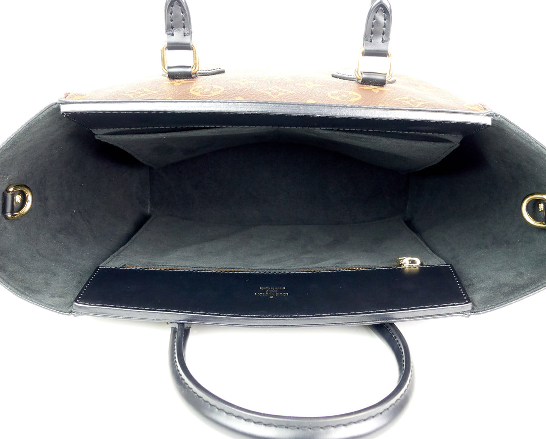 phenix mm monogram canvas and calfskin leather tote bag