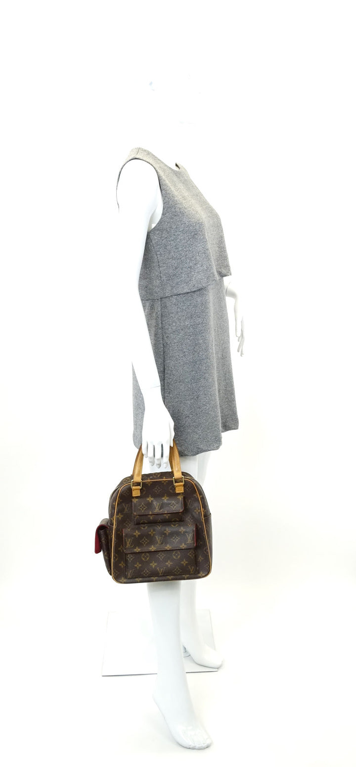 excentri cite monogram canvas handbag