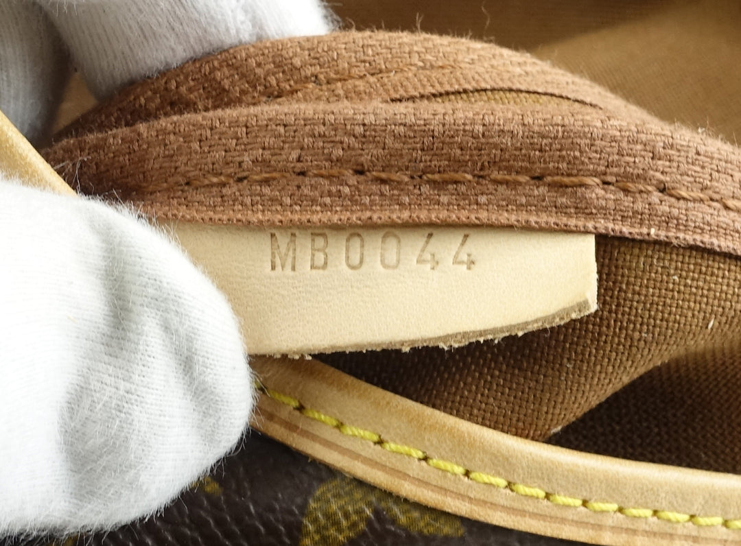 saumur 25 monogram canvas shoulder bag