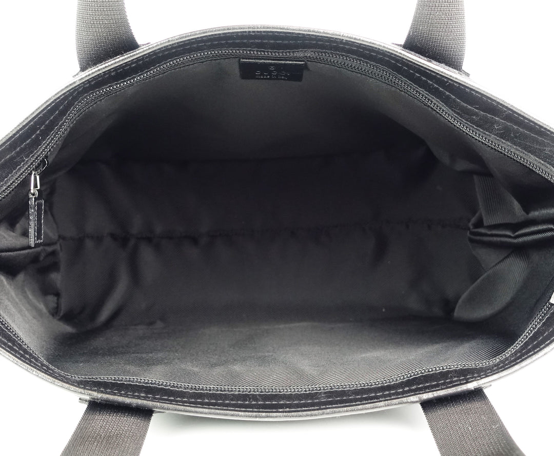 east west monogram canvas front pocket tote bag