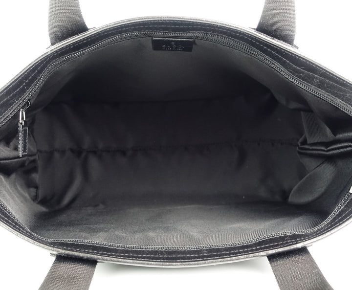 east west monogram canvas front pocket tote bag