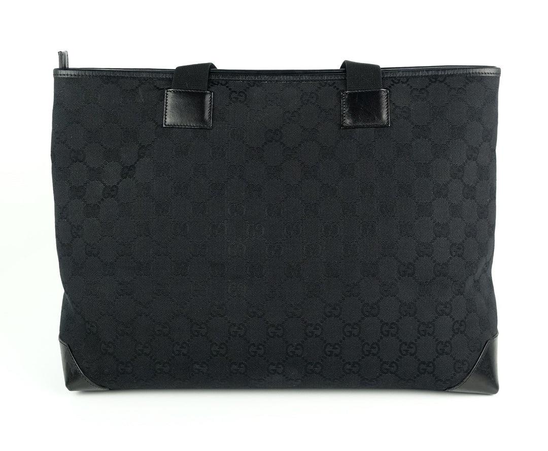 east west monogram canvas front pocket tote bag