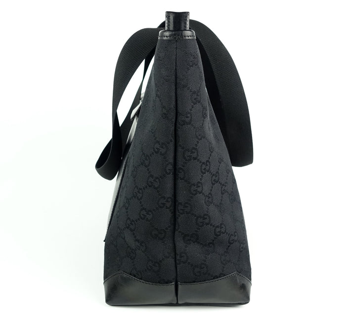 east west monogram canvas front pocket tote bag