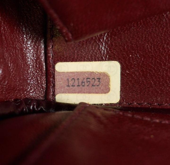 quilted lambskin leather top zip bag