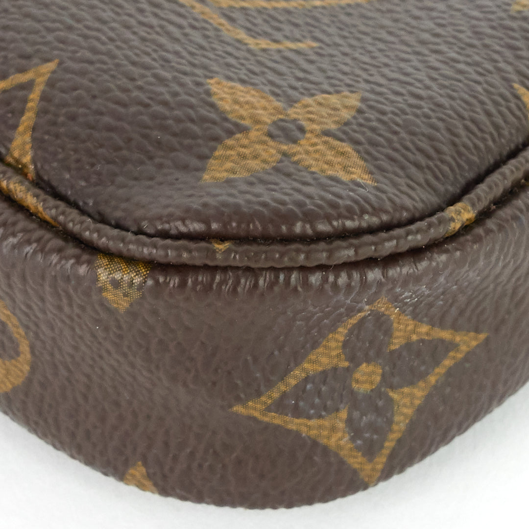 pochette accessoires mini monogram canvas bag
