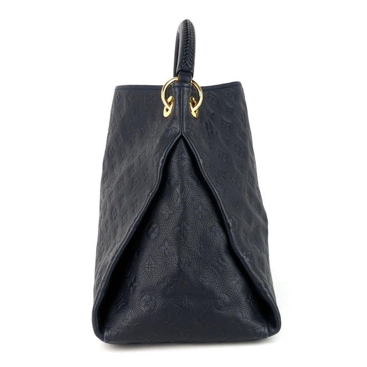 artsy mm monogram empreinte leather bag