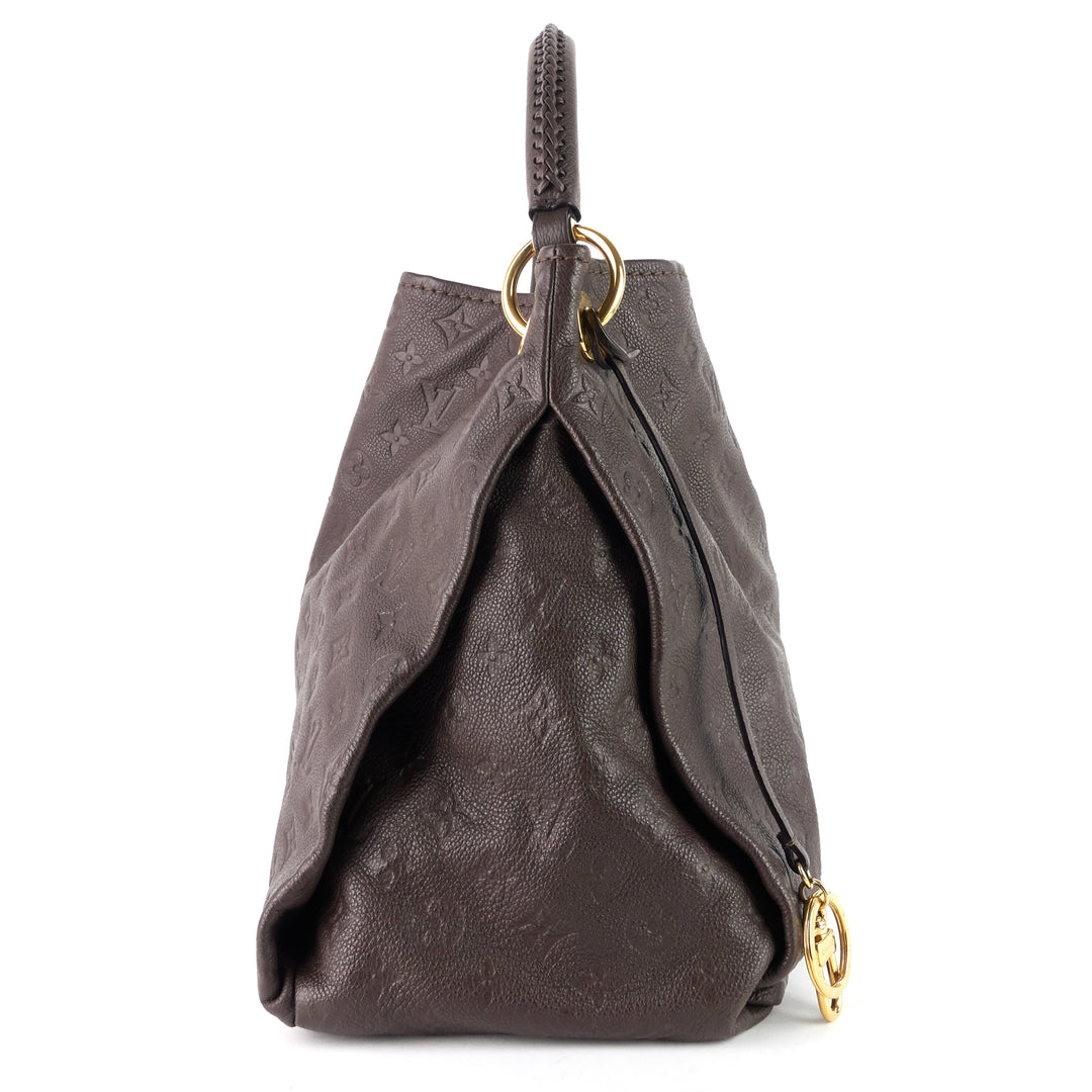 artsy mm monogram empreinte leather bag