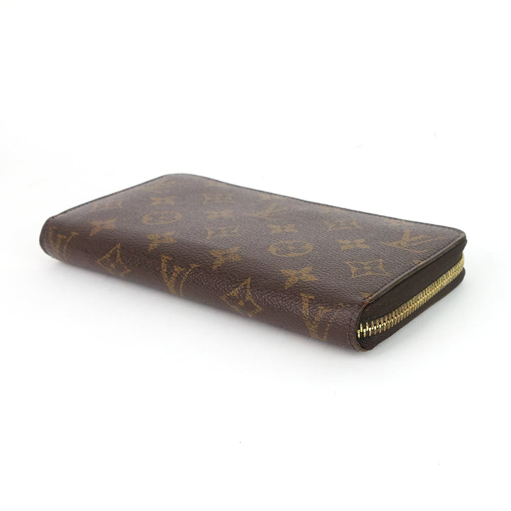 zippy monogram canvas wallet