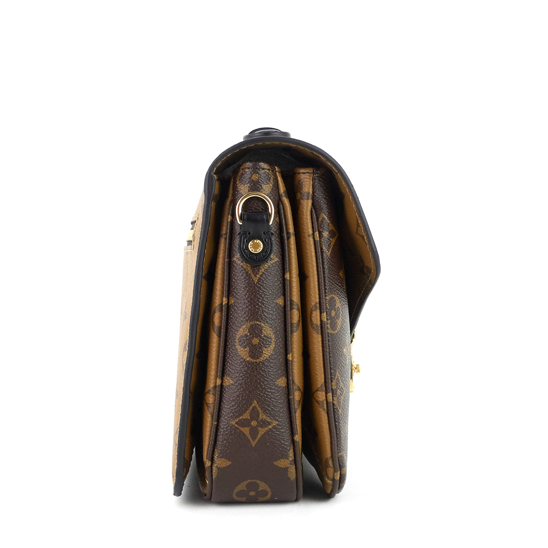 pochette metis reverse monogram canvas bag