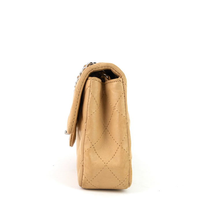 east west quilted lambskin flap bag