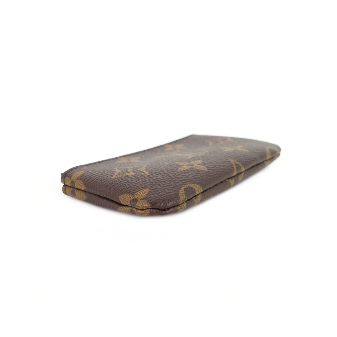 key monogram canvas pouch
