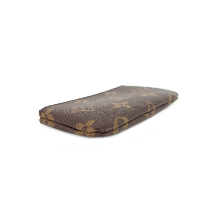 key monogram canvas pouch