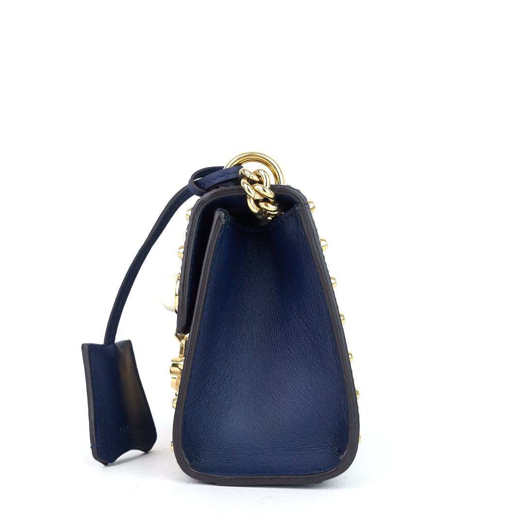 calfskin pearl studded padlock bag