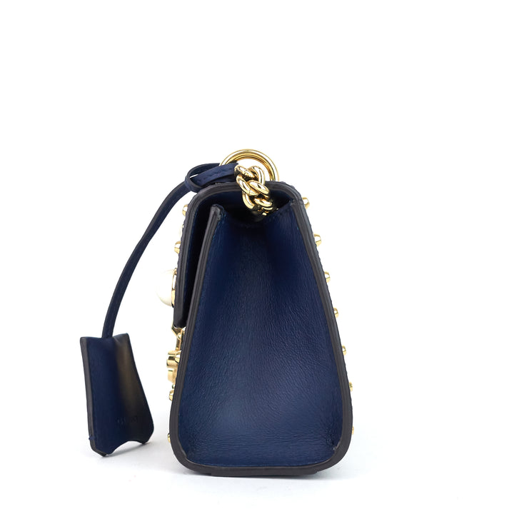 calfskin pearl studded padlock bag