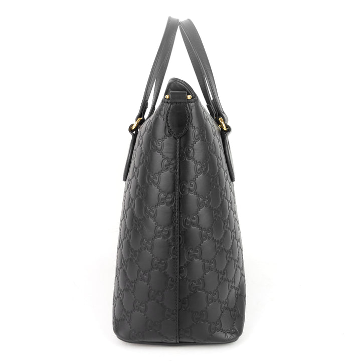 signature top handle guccissima bag