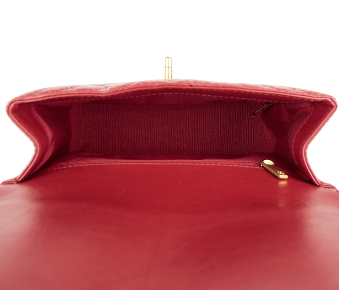 quilted chevron calfskin leather top handle bag