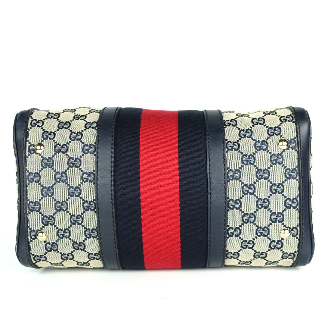 monogram canvas web boston bag with strap