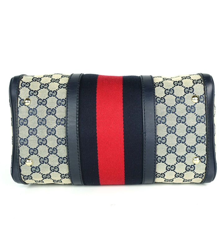 monogram canvas web boston bag with strap