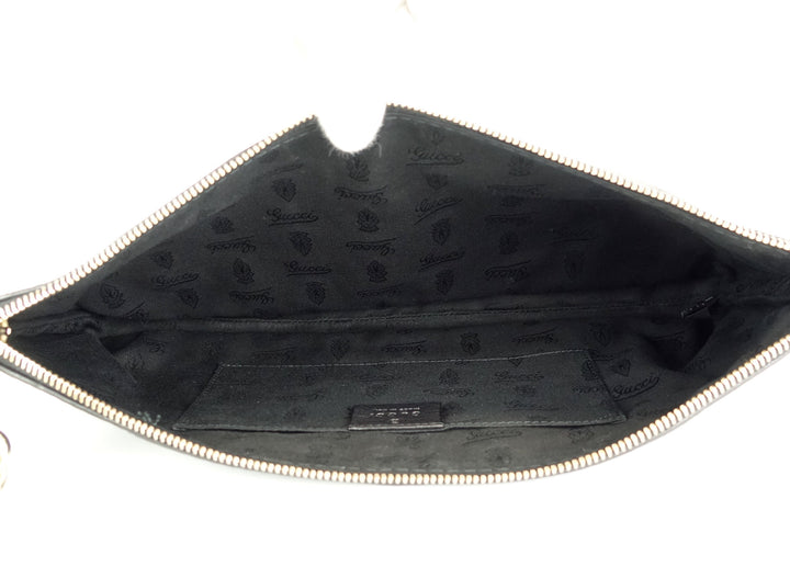 sienna grained leather tassel clutch bag