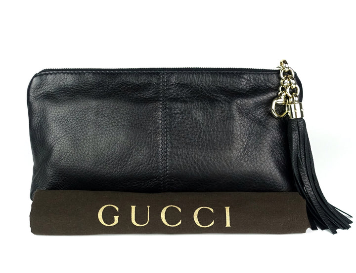 sienna grained leather tassel clutch bag