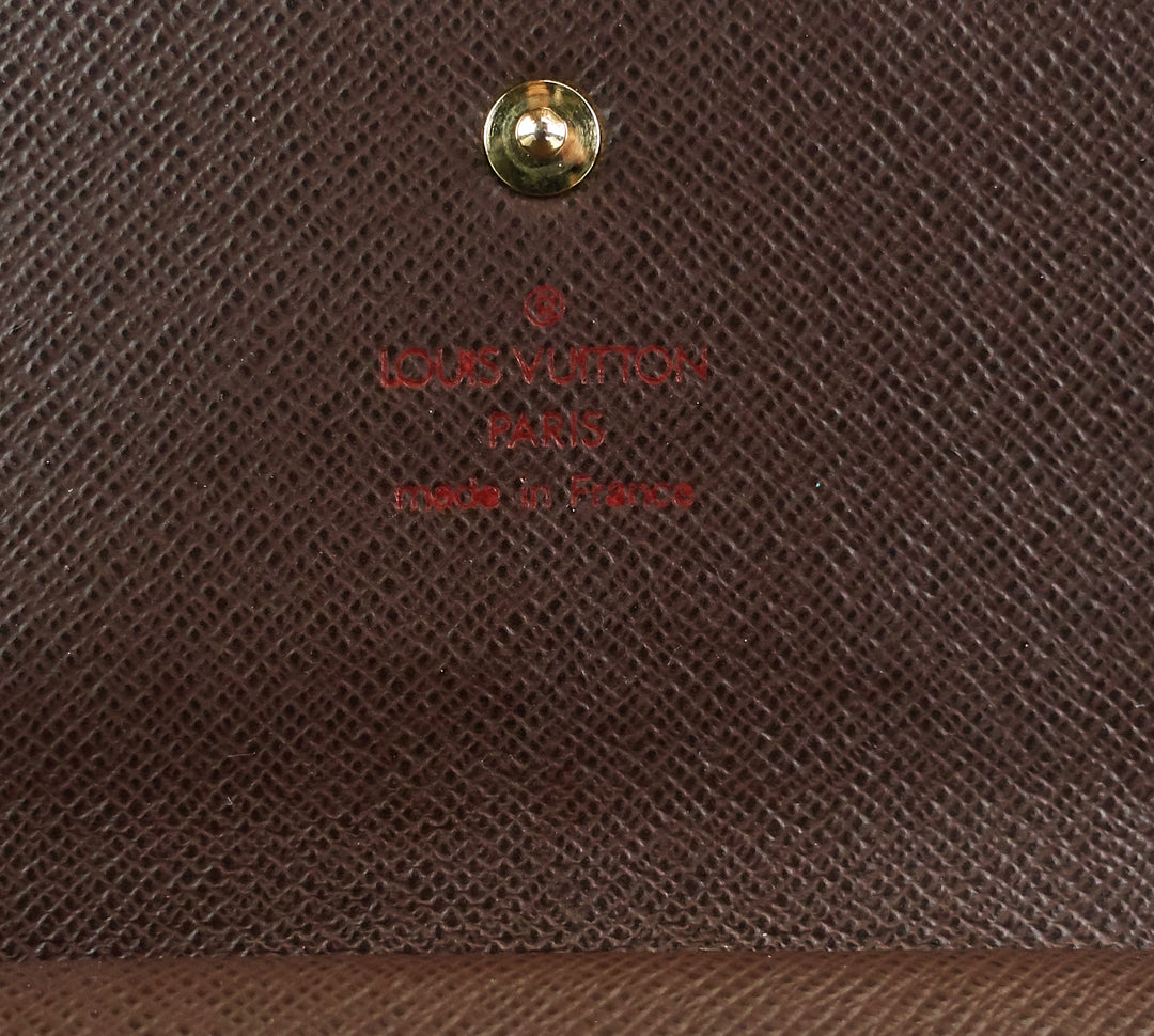 porte tresor international damier ebene canvas wallet