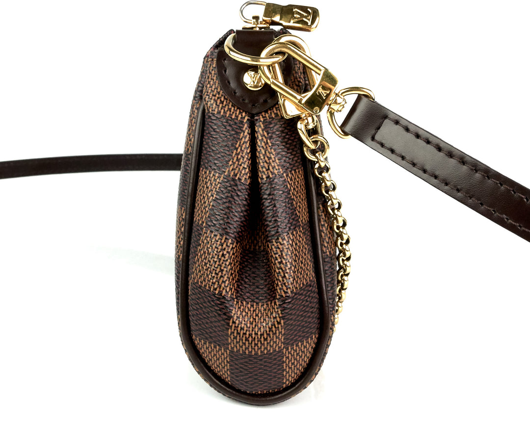 eva damier ebene canvas shoulder bag