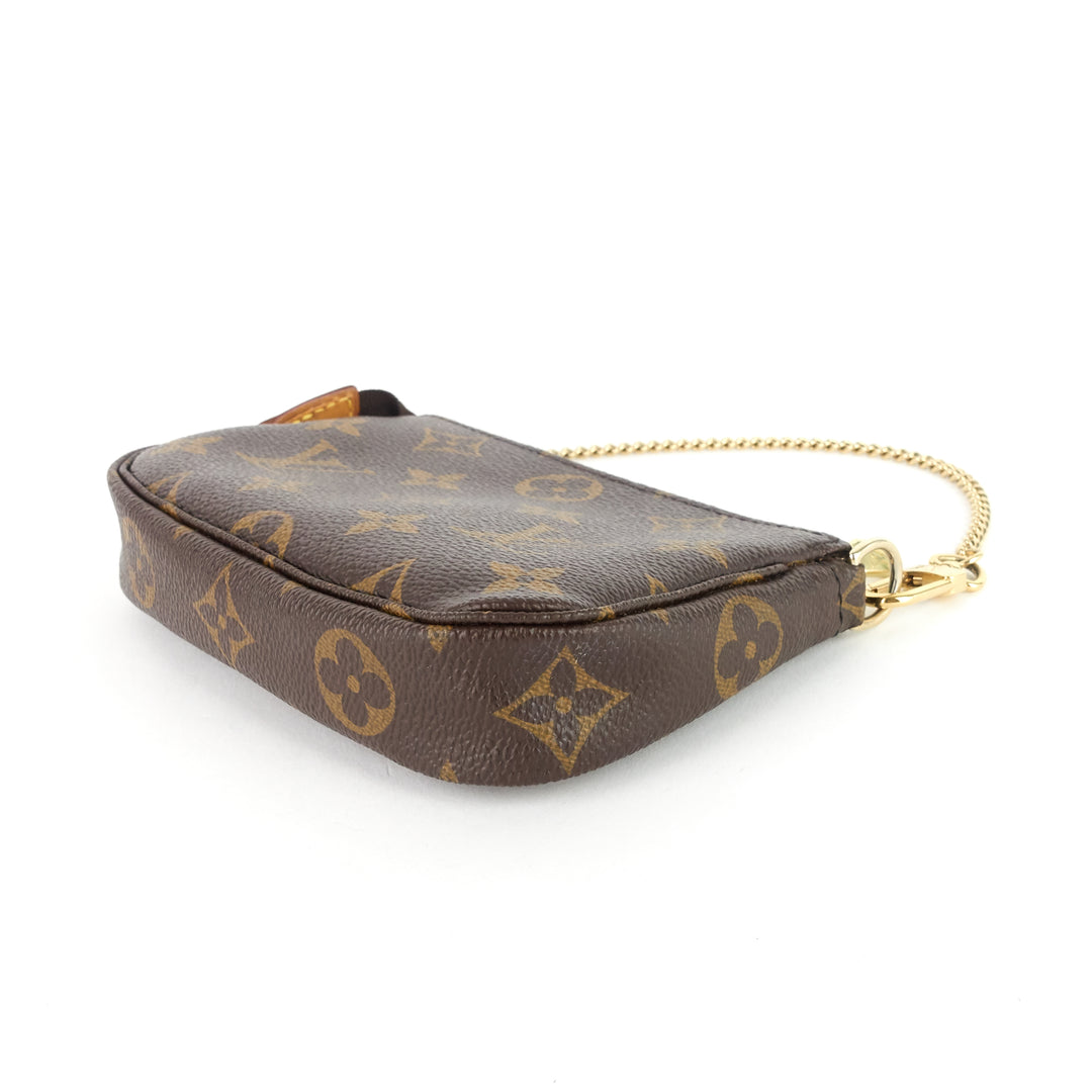 pochette accessoires mini monogram canvas bag