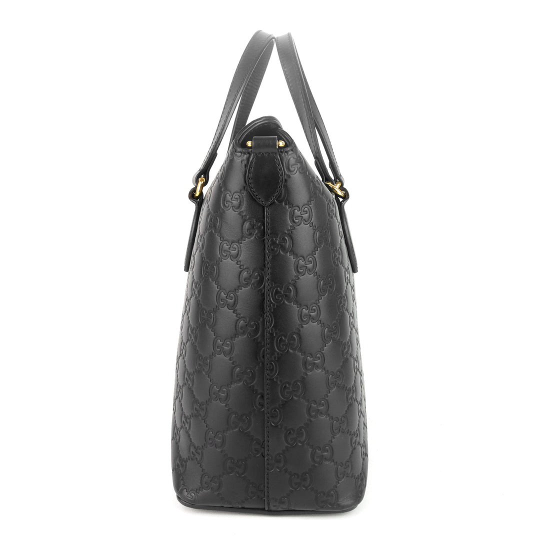 signature top handle guccissima bag