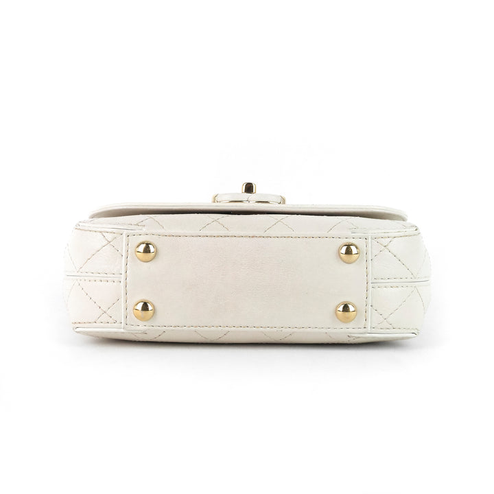 quilted leather small flap bag
