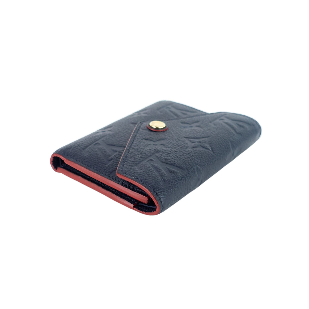 victorine monogram empreinte leather wallet