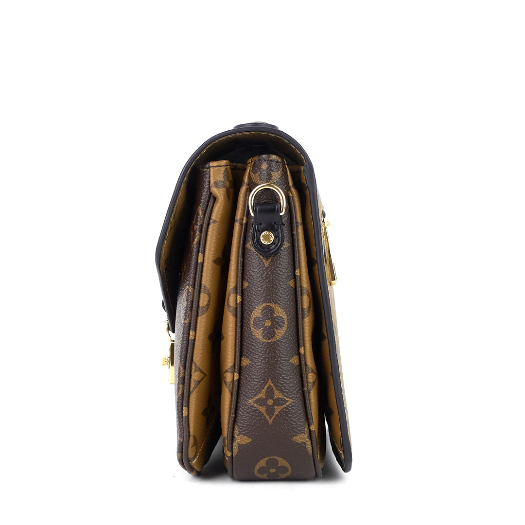 pochette metis reverse monogram canvas bag