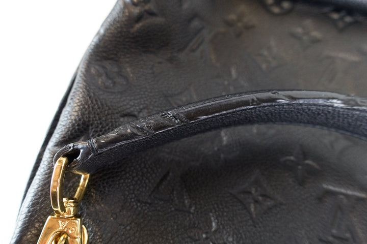 metis monogram empreinte leather hobo bag