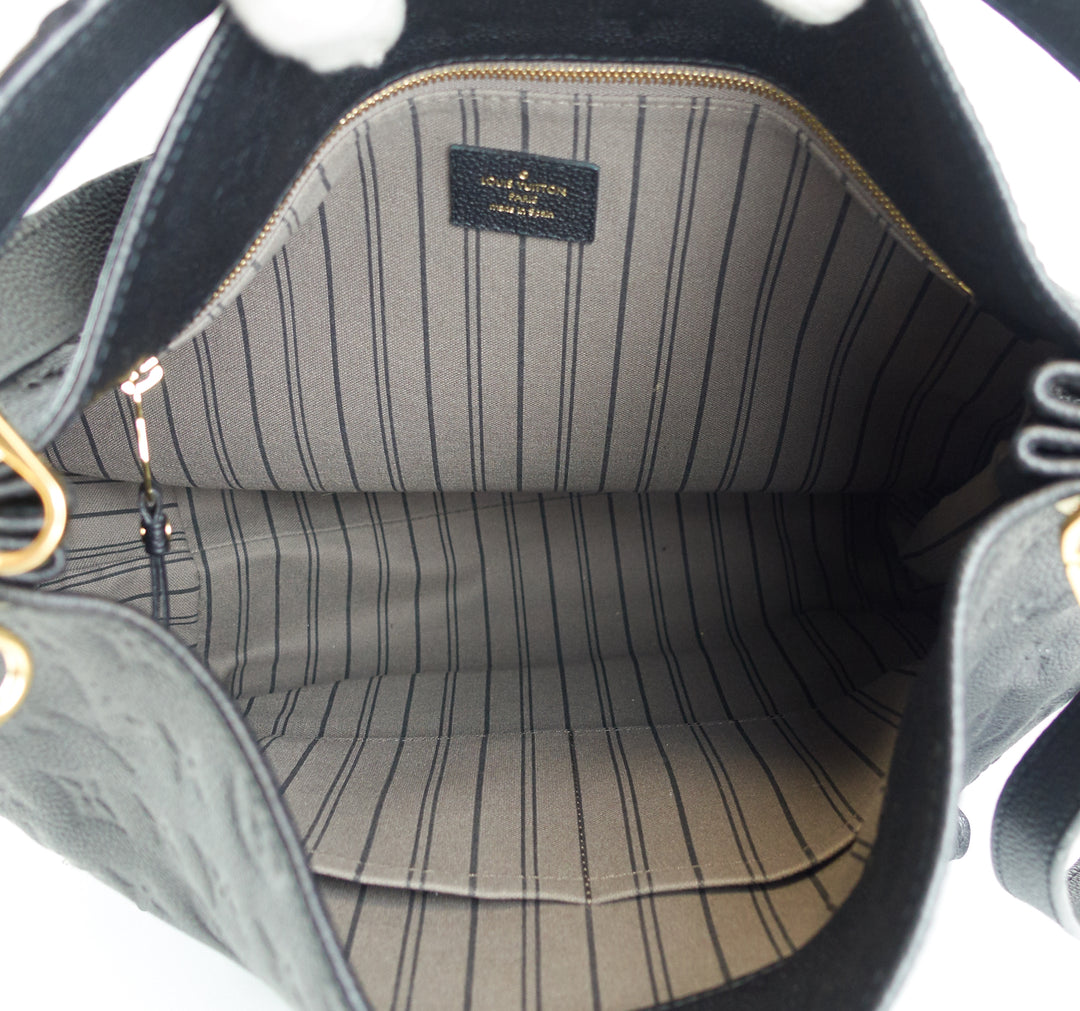 metis monogram empreinte leather hobo bag