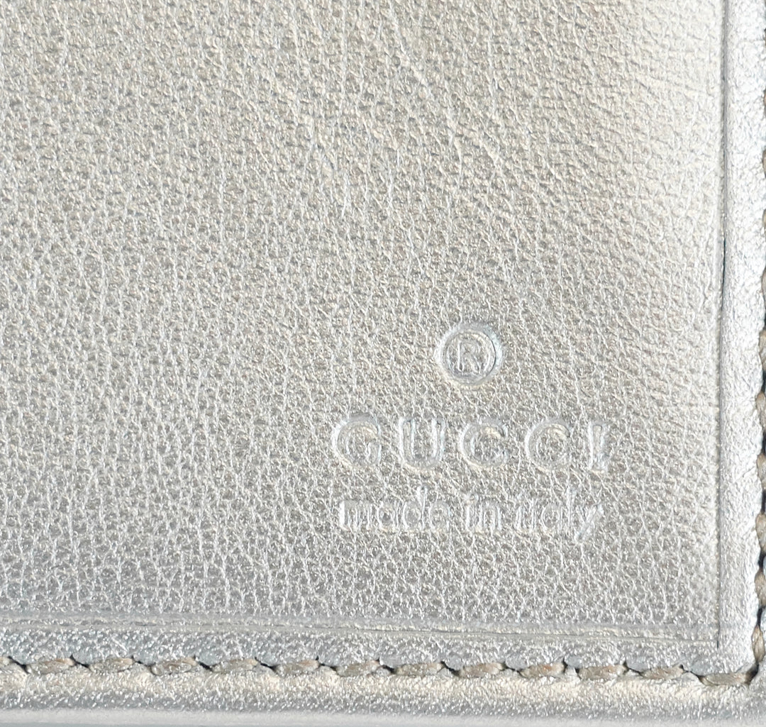 guccissima leather continental d-ring wallet