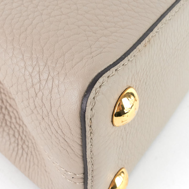 capucines bb taurillon leather bag