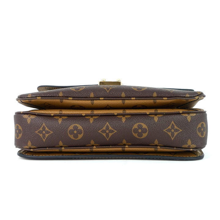 pochette metis reverse monogram canvas bag