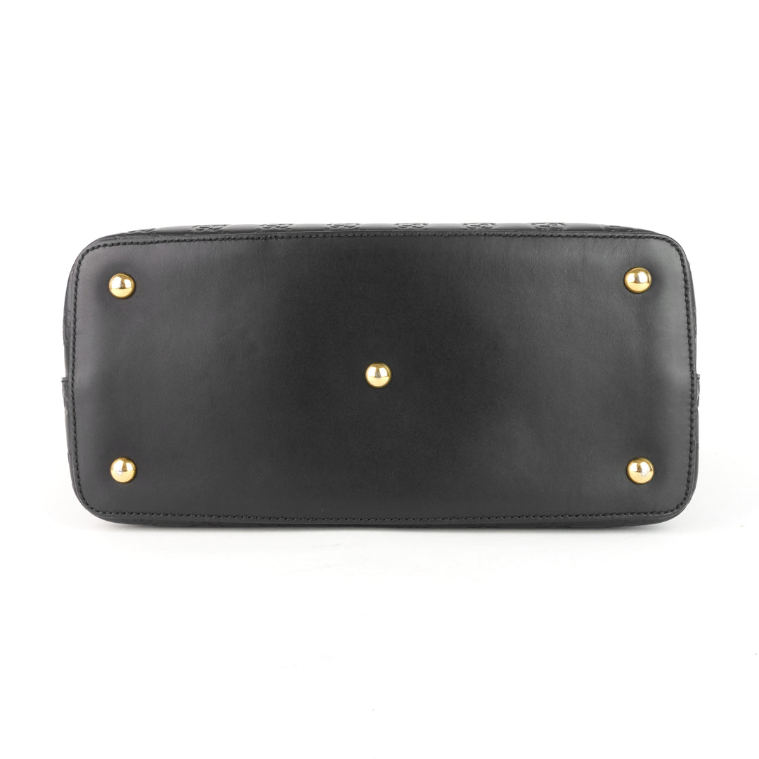 signature top handle guccissima bag