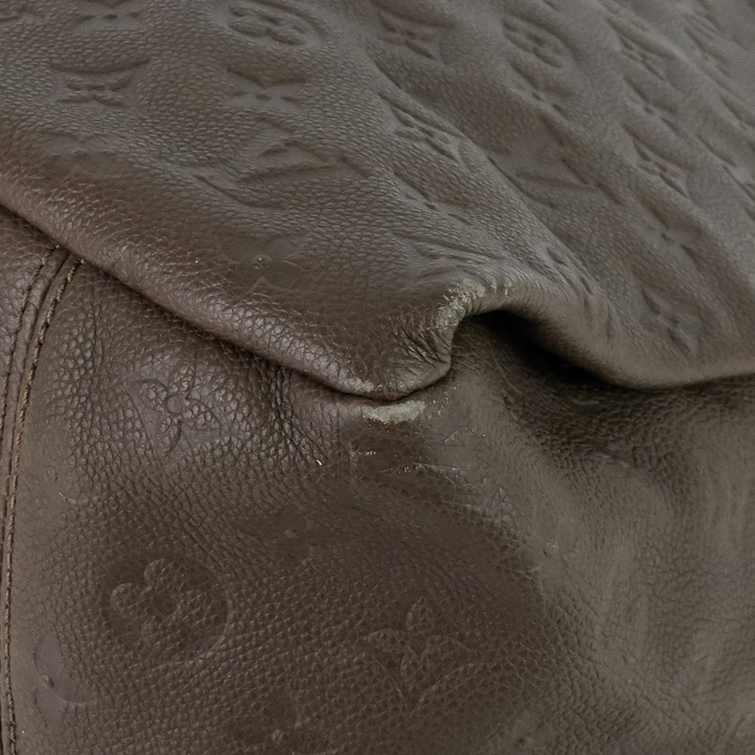 artsy mm monogram empreinte leather bag