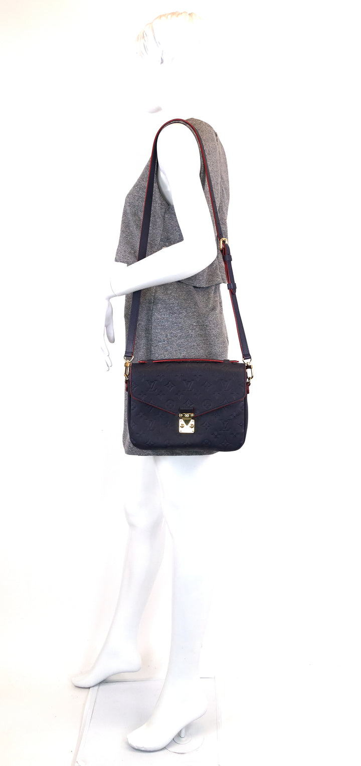 pochette metis mm monogram empreinte leather bag