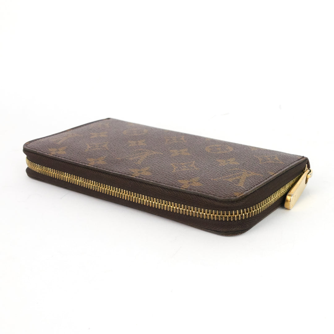 zippy monogram canvas wallet