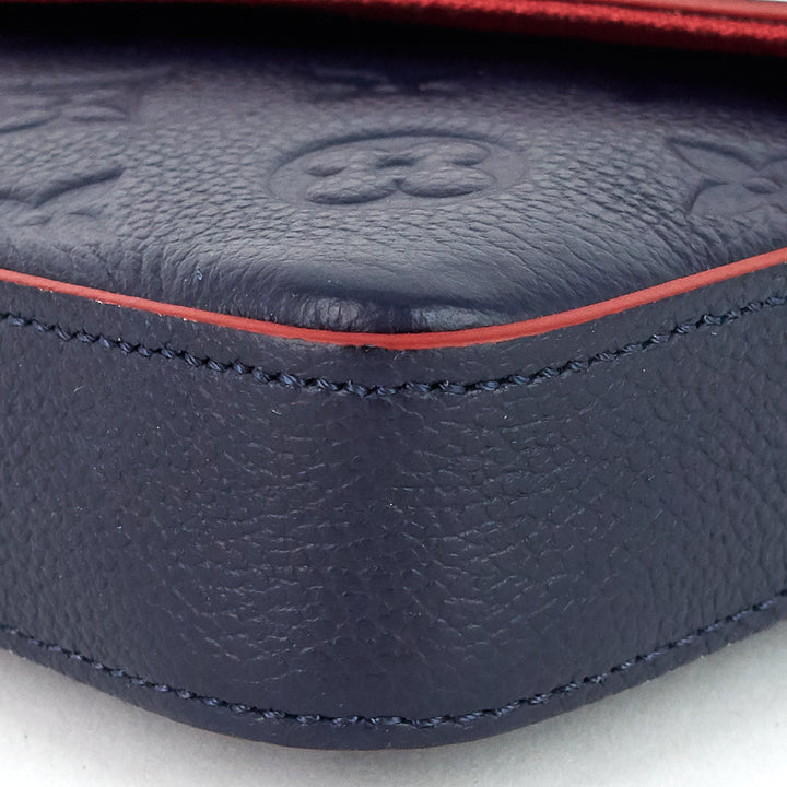 félicie pochette monogram empreinte leather bag