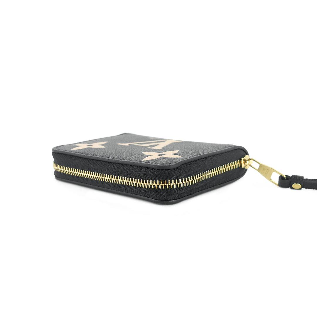 zippy bicolour monogram empreinte leather coin purse