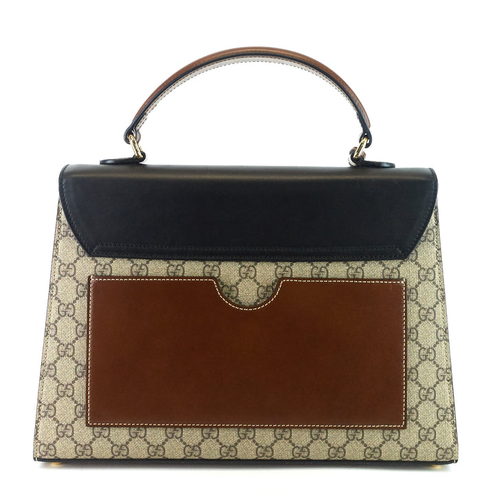 padlock supreme monogram canvas top handle medium bag