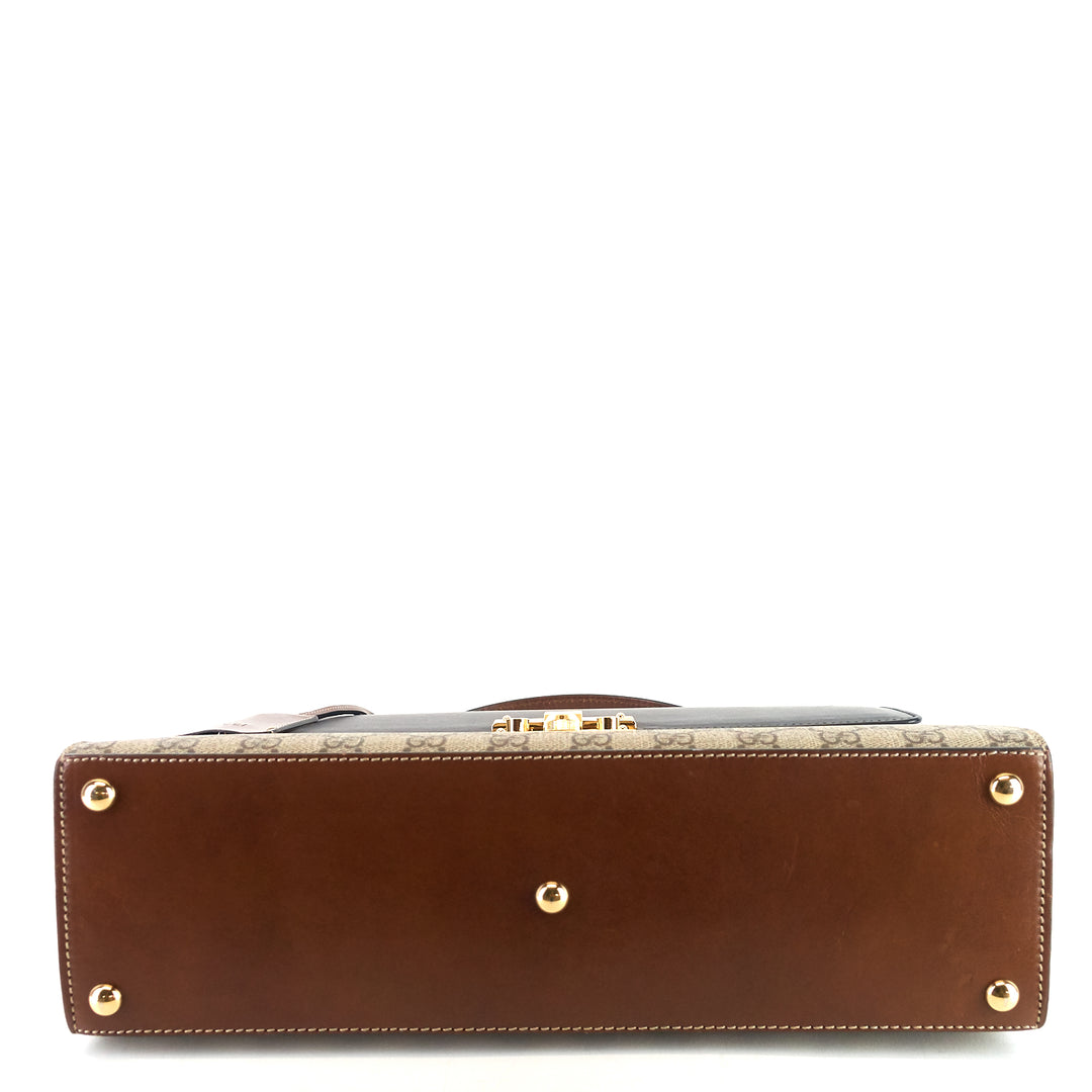 padlock supreme monogram canvas top handle medium bag
