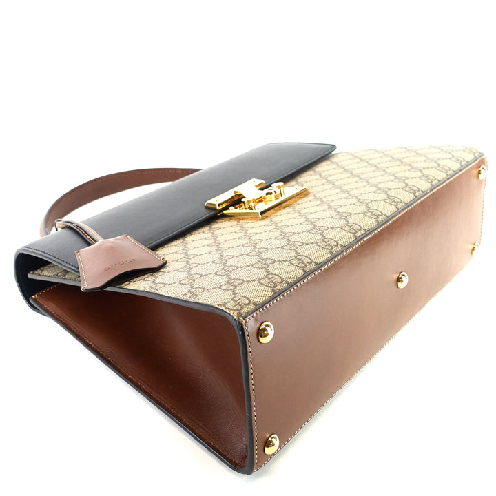 padlock supreme monogram canvas top handle medium bag