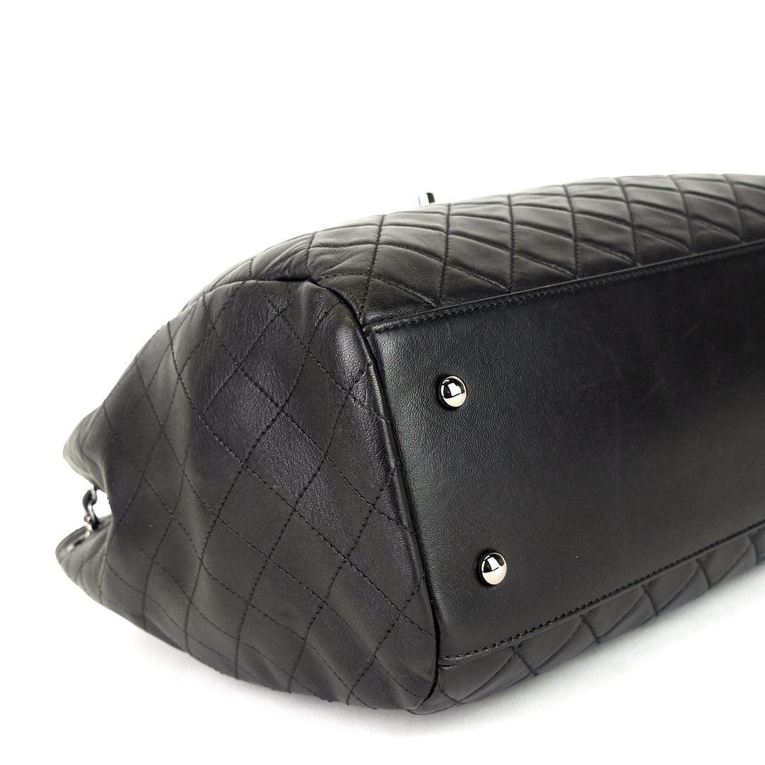 drawstring cc lock quilted lambskin leather bucket bag