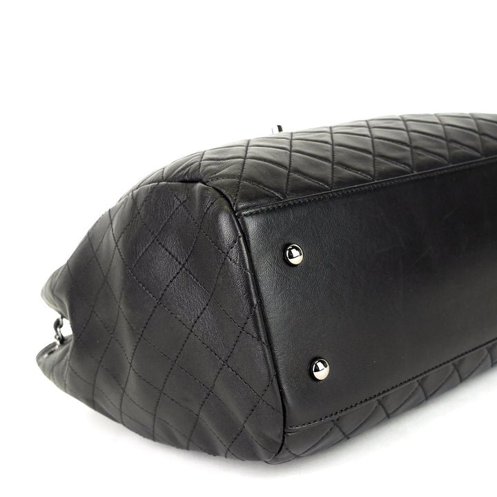 drawstring cc lock quilted lambskin leather bucket bag