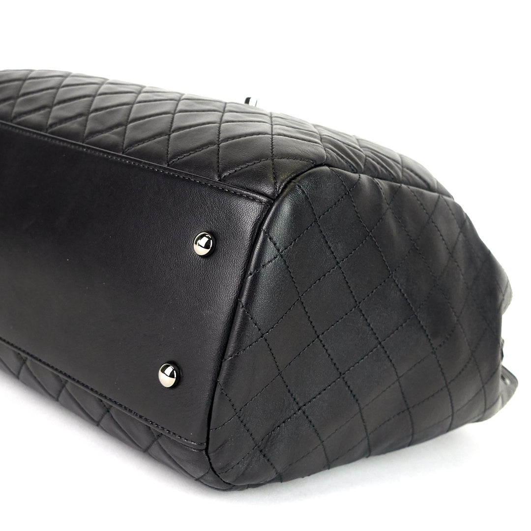 drawstring cc lock quilted lambskin leather bucket bag