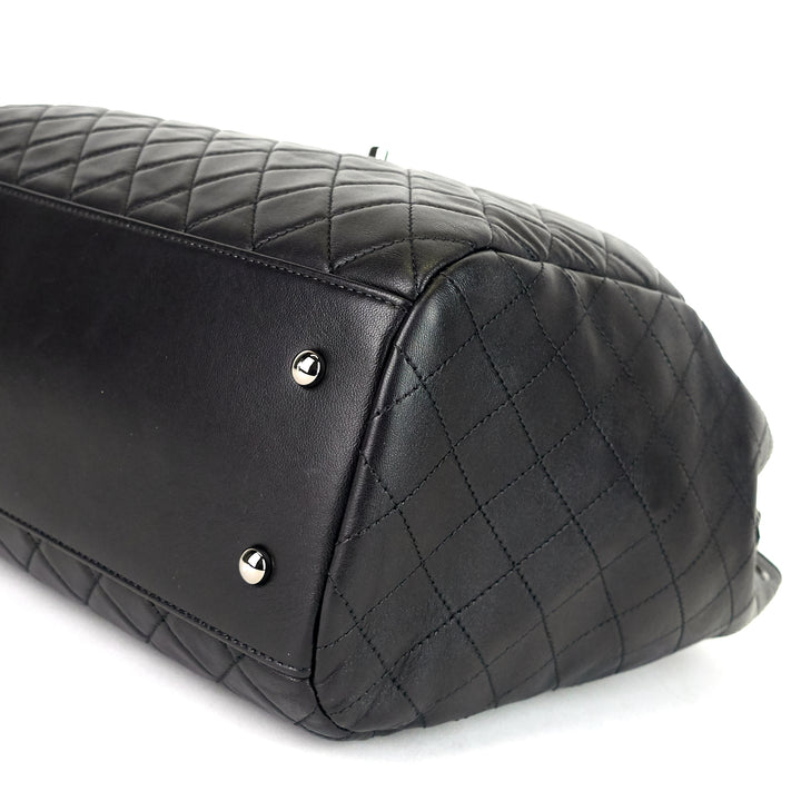 drawstring cc lock quilted lambskin leather bucket bag